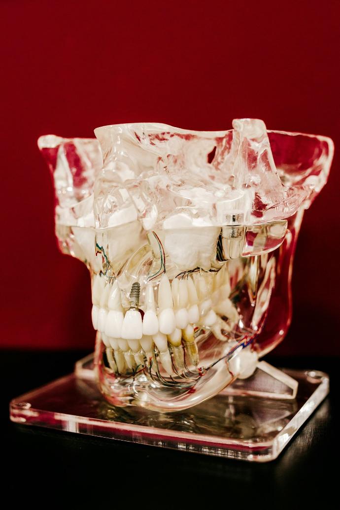 white round beads in clear glass bowl